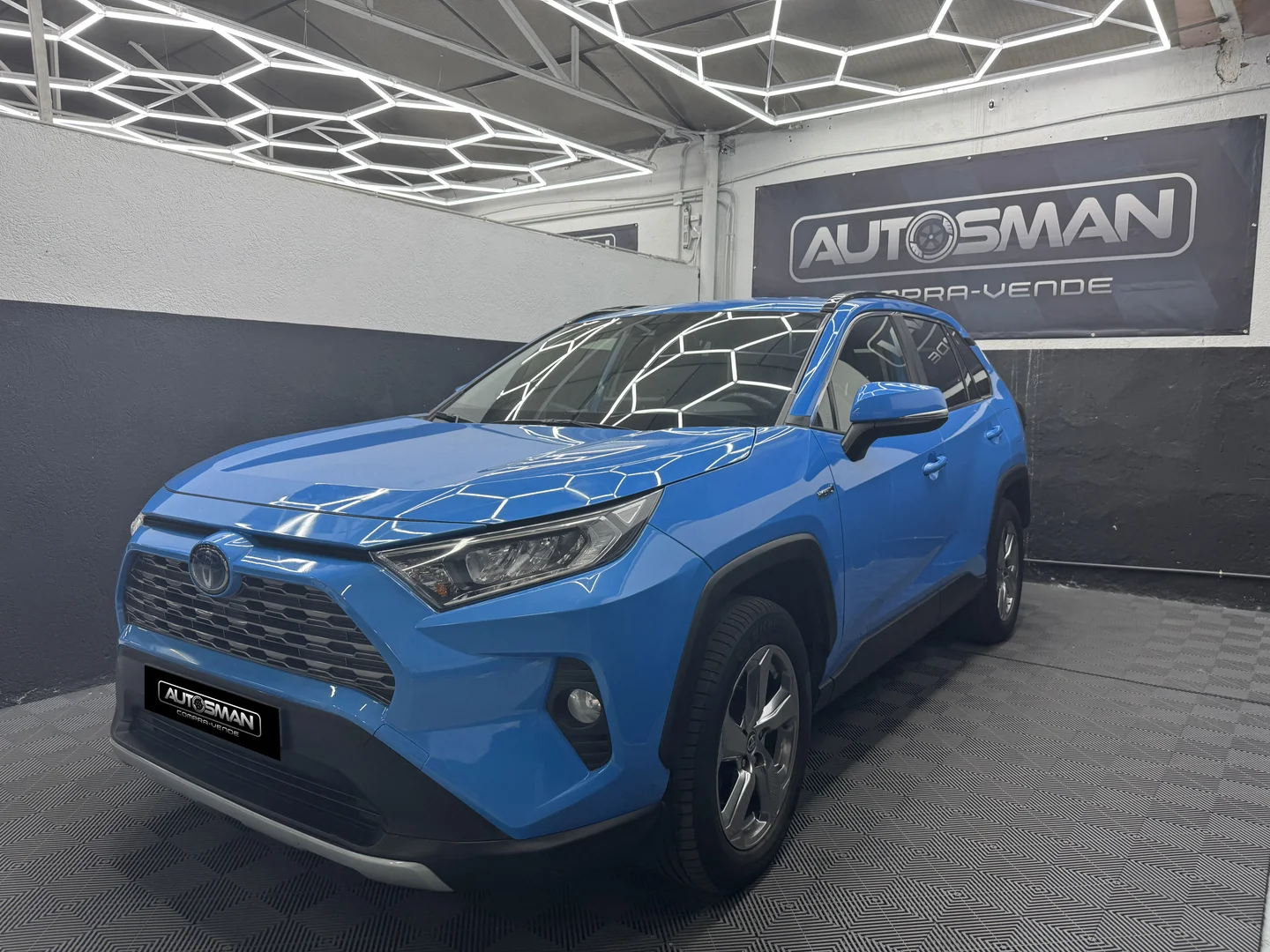 TOYOTA RAV4 2.5l 220H Style 2021 Híbrido Azul - Vista lateral